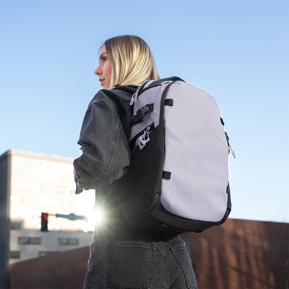 Woman wearing Purple Stratus Photo 18L Backpack Angled